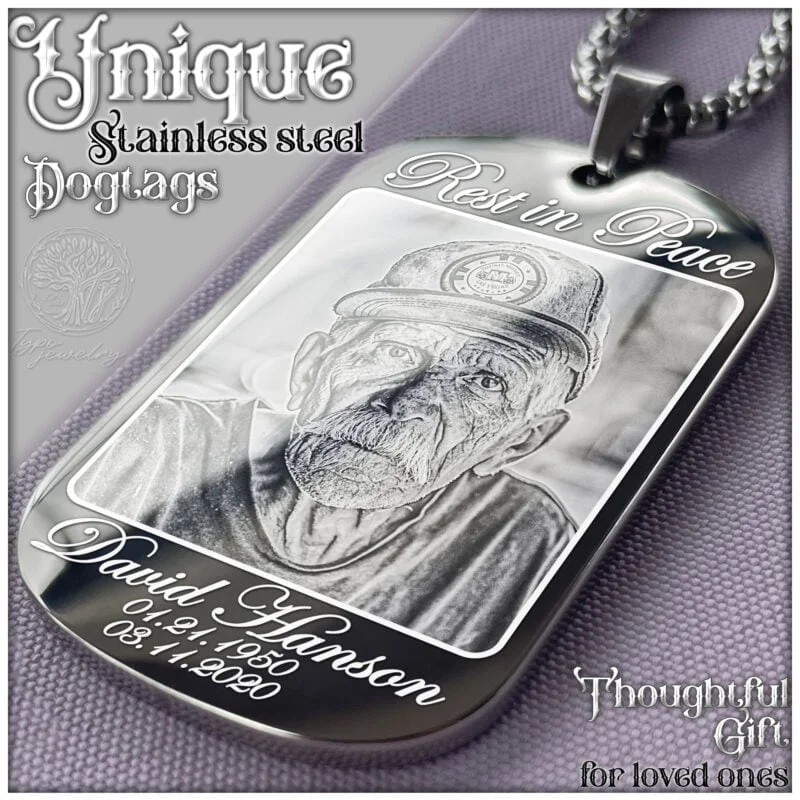 A personalized charm dogtag with engraved text.